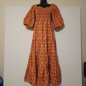 Noonday Collection Puff Sleeve smocked Ikat Brown And Dusky Pink Midi Dress